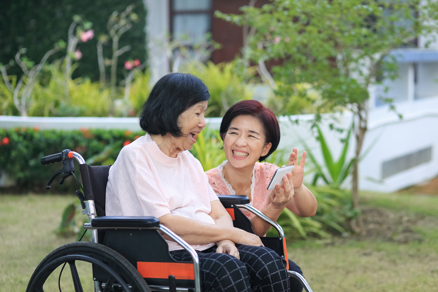 Daughter Caring for Elderly Parent